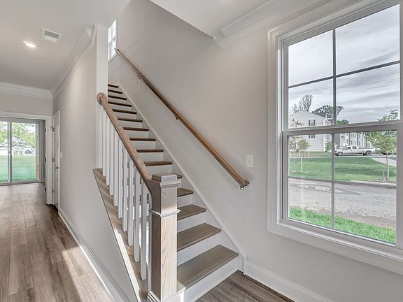 Foyer with Optional Oak Stairs and Open Rails