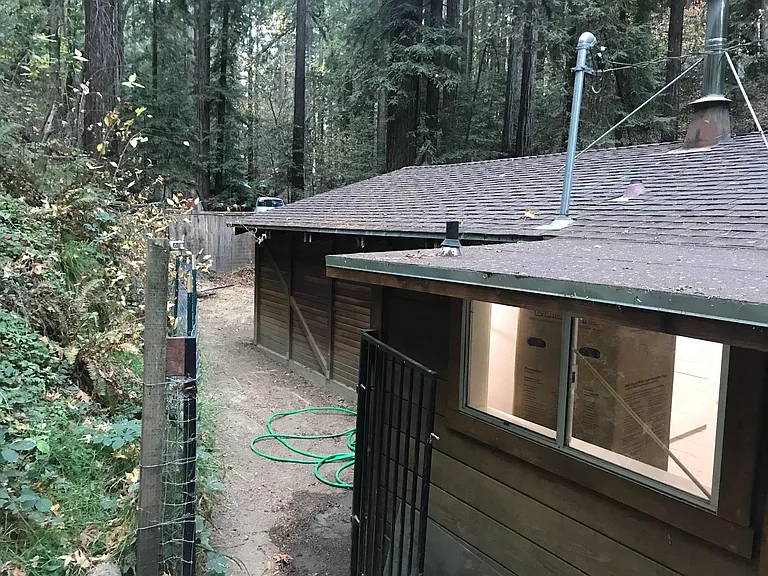 Windows of utility room; entrance to backyard