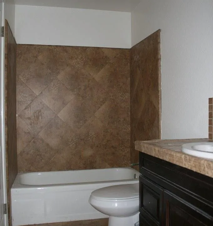 Bathroom has 2 access doors