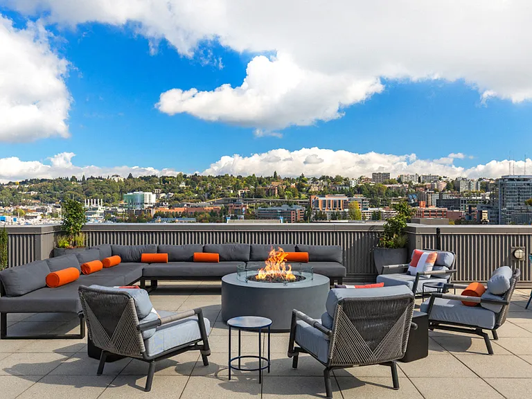 Rooftop deck with lounge areas, gas grills and impeccable views of Lake Union