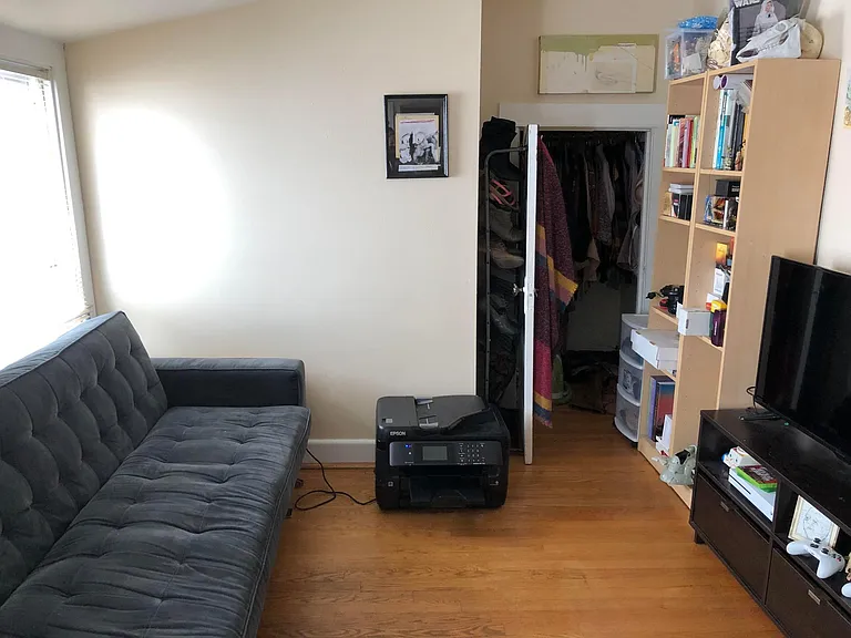 another view of bedroom on left side of the front hallway