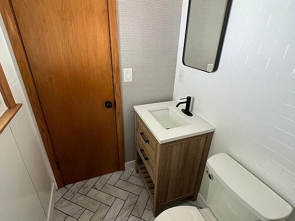 4th image of 11910 W Dearbourn Ave