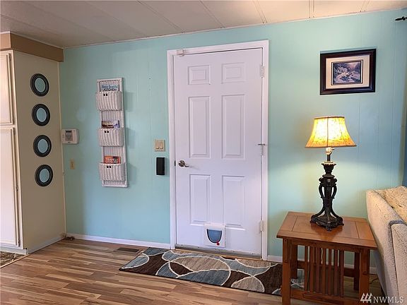 The front door leads to a surprisingly fresh and inviting interior.