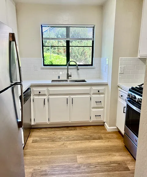 Kitchen was updated, newer stainless steel appliances, including refrigerator, gas stove, and dishwasher,