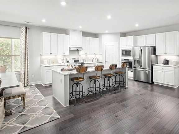 gourmet kitchen with chef oven and microwave