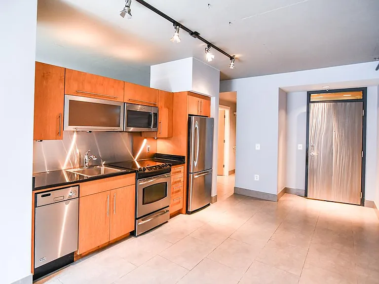 Modern Kitchen with Stainless Steel Appliances and Granite Countertops