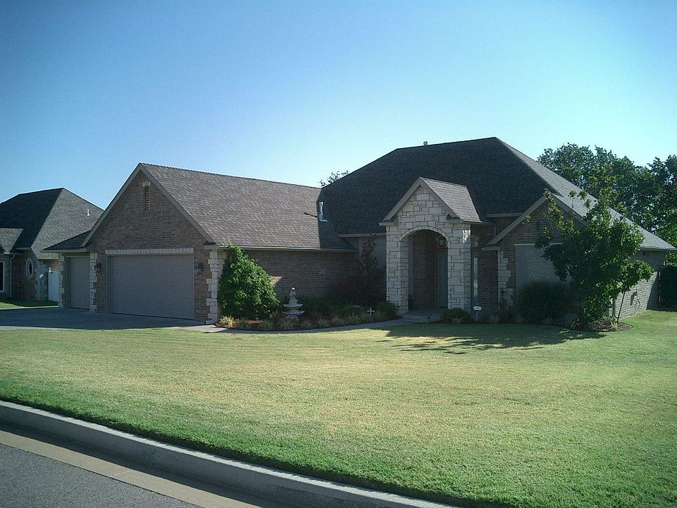 3 Car Garage and 4th Bay opening to back yard