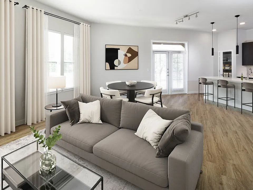 Dining and living room with hard surface flooring