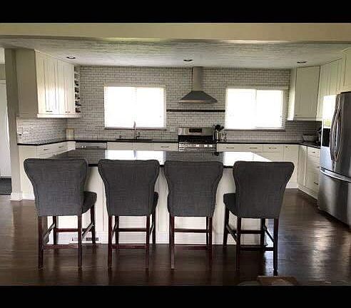 Kitchen with 9 x 4 ft island, granite countertops, tons of space