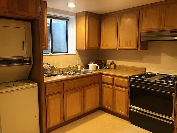 Kitchen with stackable washer/dryer