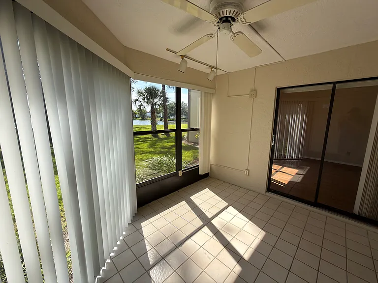 patio with lake view. Access from the master bedroom and living room