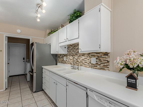 5th image of 10858 W COGGINS Drive