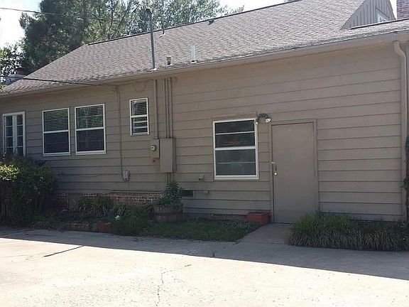Converted garage offers work space and ample storage