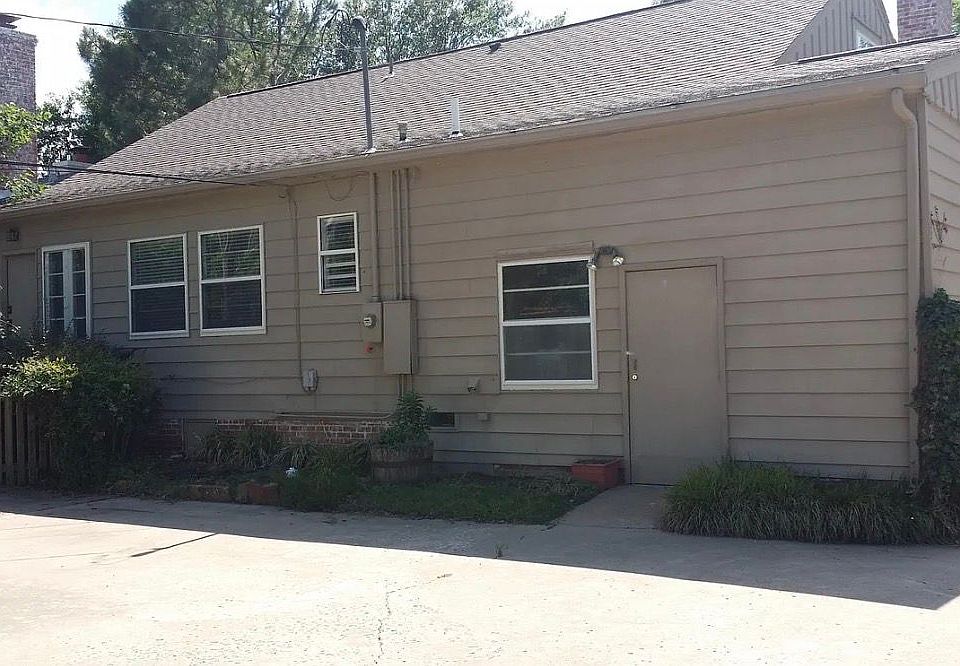 Converted garage offers work space and ample storage