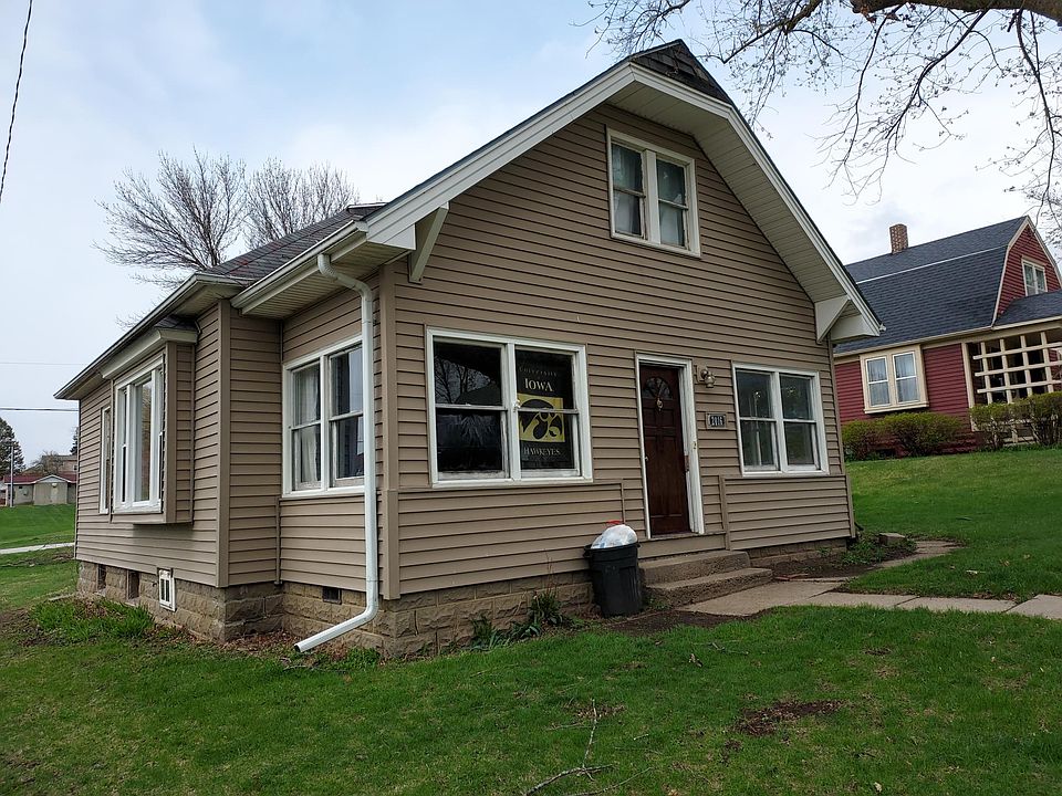 Tan siding is relatively new and in very good condition. The many windows provide sunlight and views outside. City park and pool is across the street north.