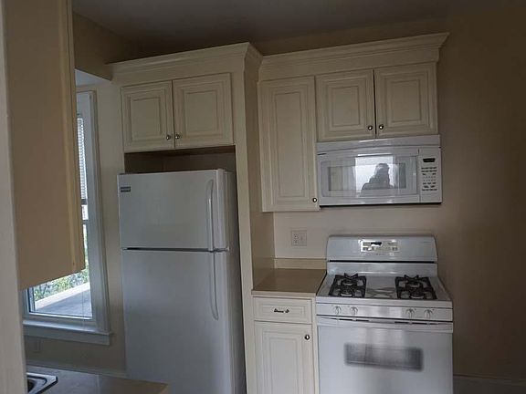 Gas stove with built-in microwave and new cabinets