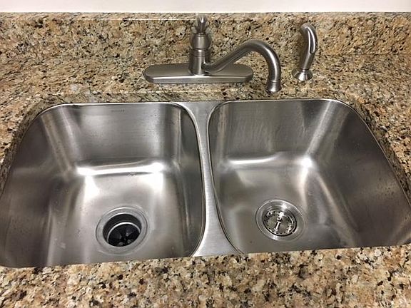 Kitchen with granite and new sink / faucet