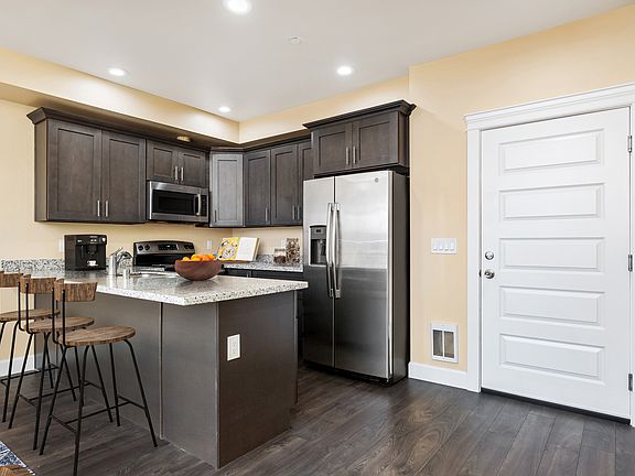 Premium finishes and clean lines create a polished, functional cooking space.