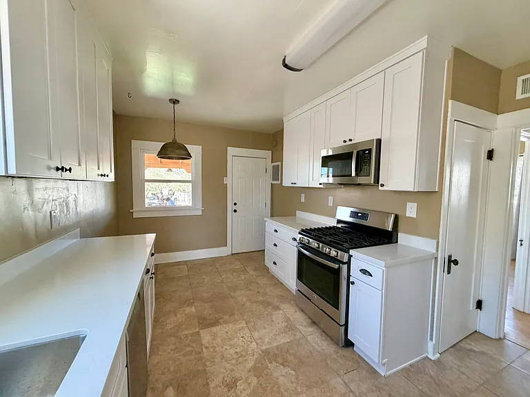 Brand new quartz countertops and cabinets