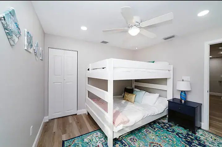 Queen over queen bunk beds for the kids or friends.