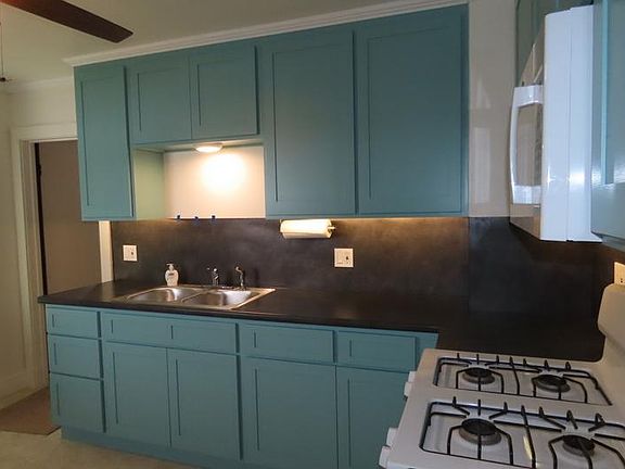 view of kitchen showing doorway to living room