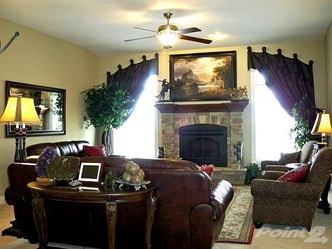LIVING ROOM w/STONE FIREPLACE