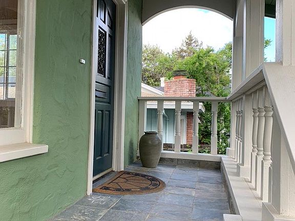 Steps up to the covered front entry.