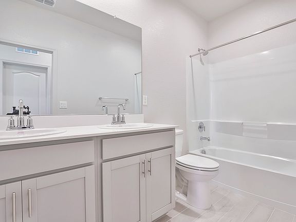 Residence 1 secondary bathroom at a nearby Meritage community.