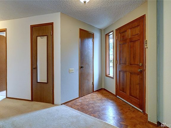 Receive your guests in the foyer. A handy coat closet for coat and shoe storage. 
