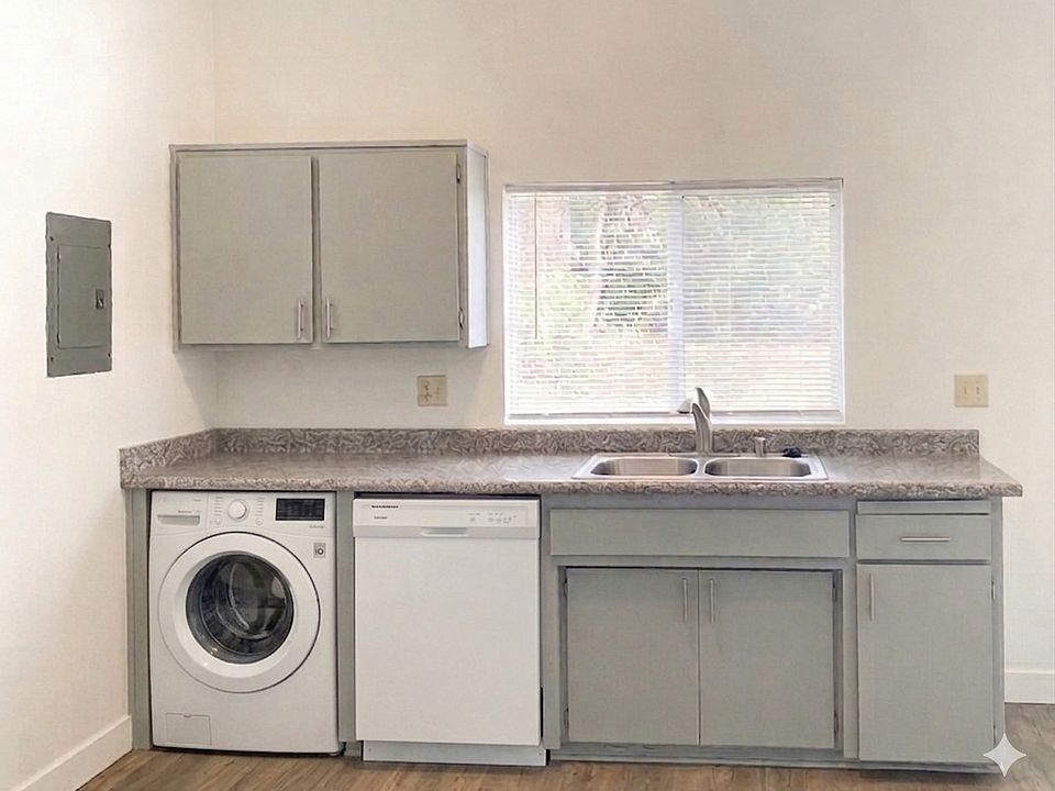Kitchen with dishwasher and washer hook up