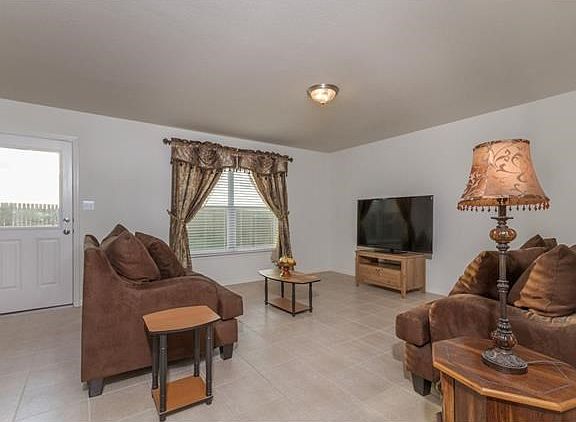 Family room has views of backyard.