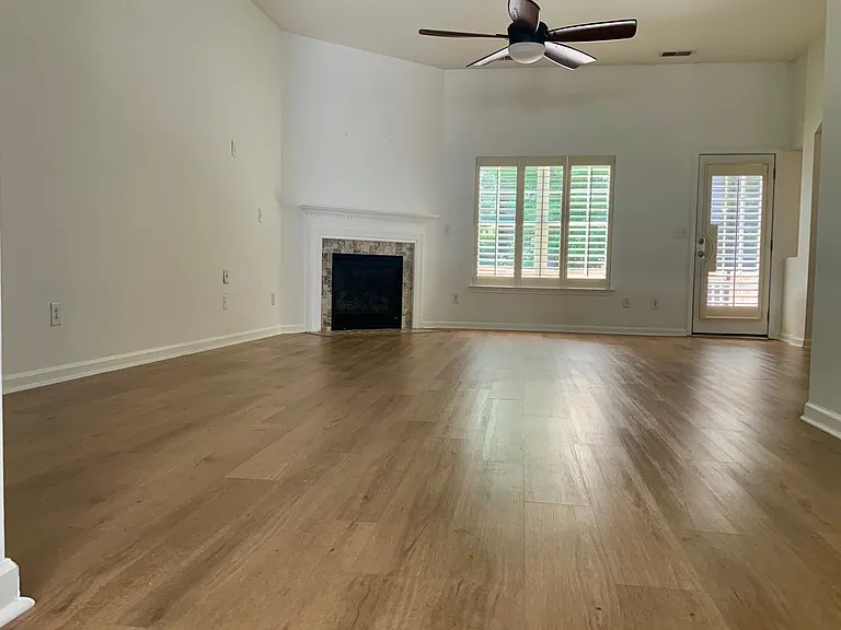 New flooring in entire house - living room with new flooring