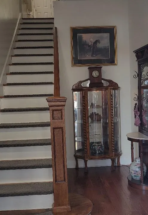 Stair case leading up to apartment.