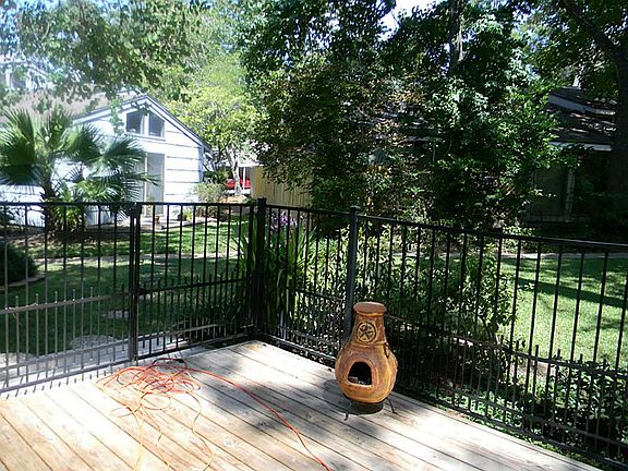 New Deck with wrought iron fence
