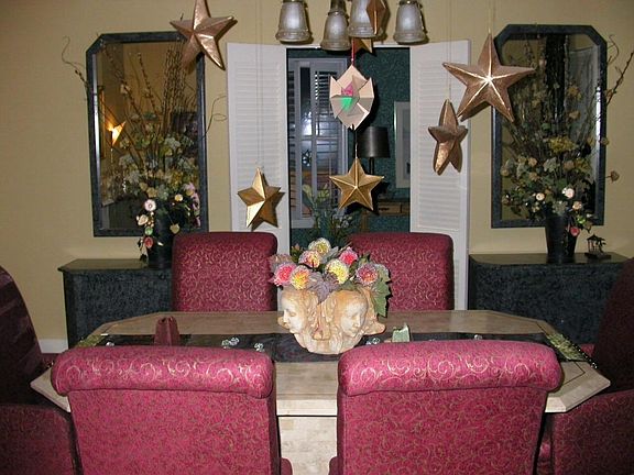 dining room is through an arched door form the living room
