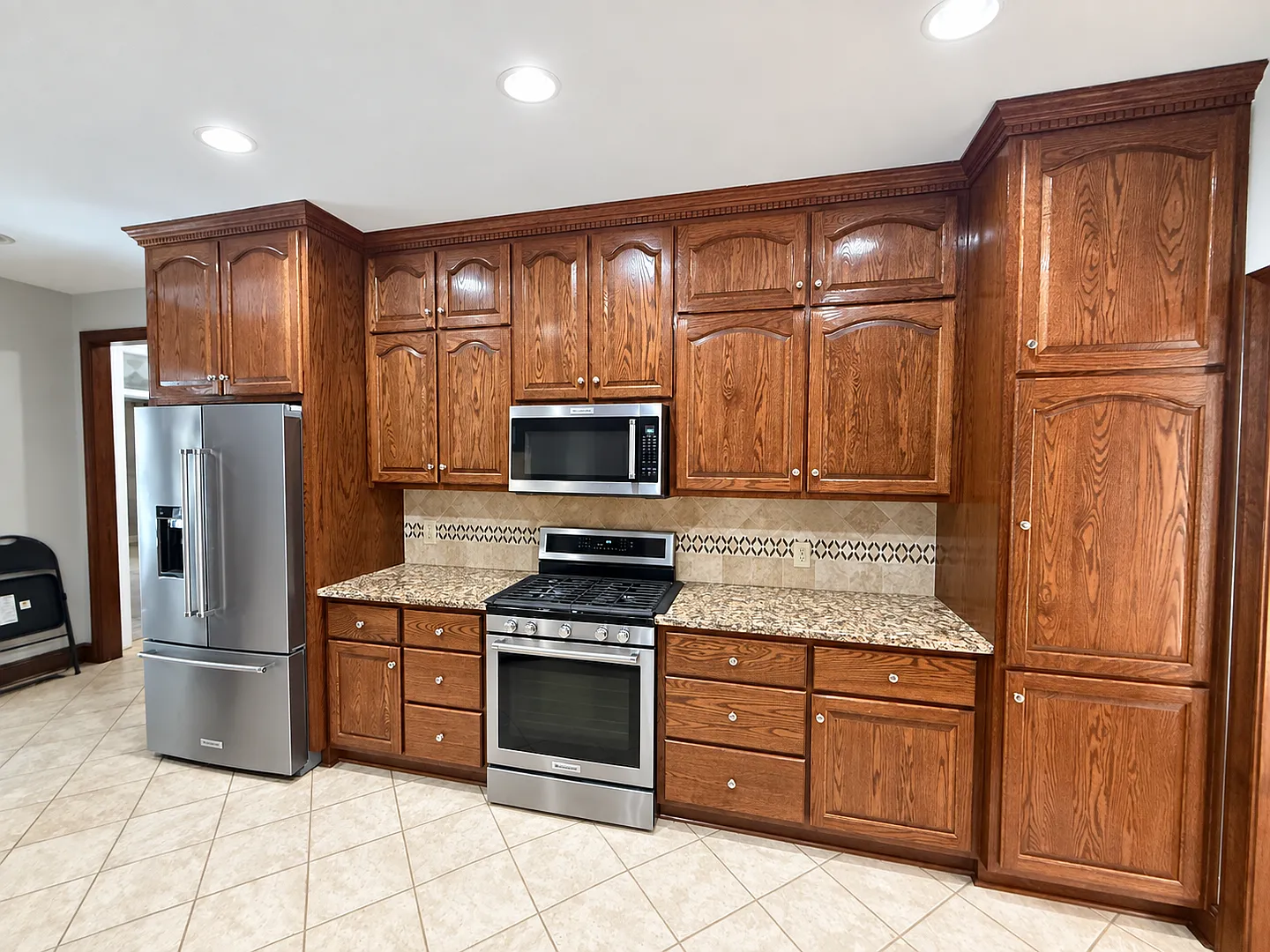 Spacious 7-Bedroom, 4-Bath Home with Finished Basement, Sunroom & Outdoor Kitchen — Photo 4