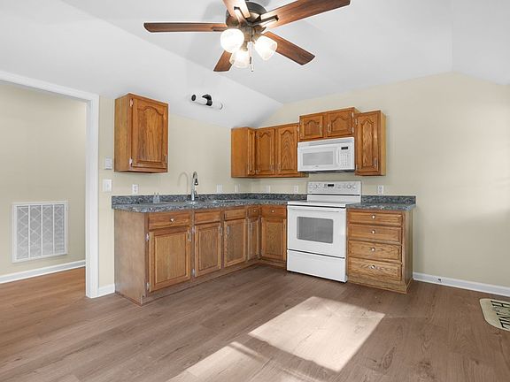4th image of 6498 Church St