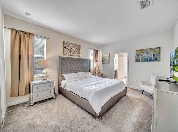 King-Size Bedroom
Step into a spacious king-size bedroom designed for comfort and relaxation. Featuring plush bedding, elegant decor, and plenty of natural light, this retreat offers the perfect spot to unwind after a long day.