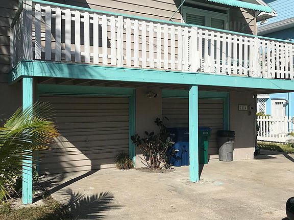 This is the front of the house from the street and parks 2 cars.