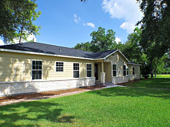This home is absolutely gorgeous featuring new granite, tile, gleaming refinished hardwood, new cabi