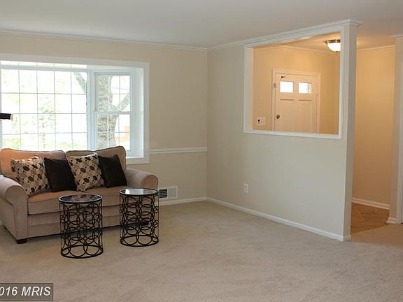 Featuring chair and crown molding