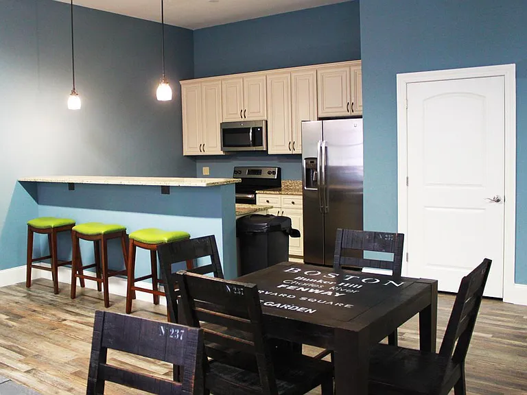 Community Room with full kitchen, fireplace & lounge area