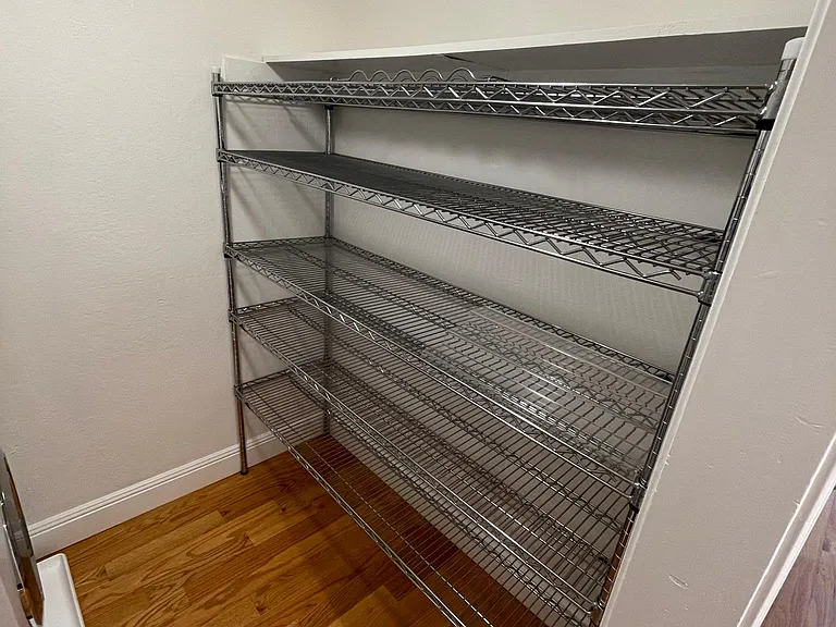 Storage for clothes and/or extra pantry items.