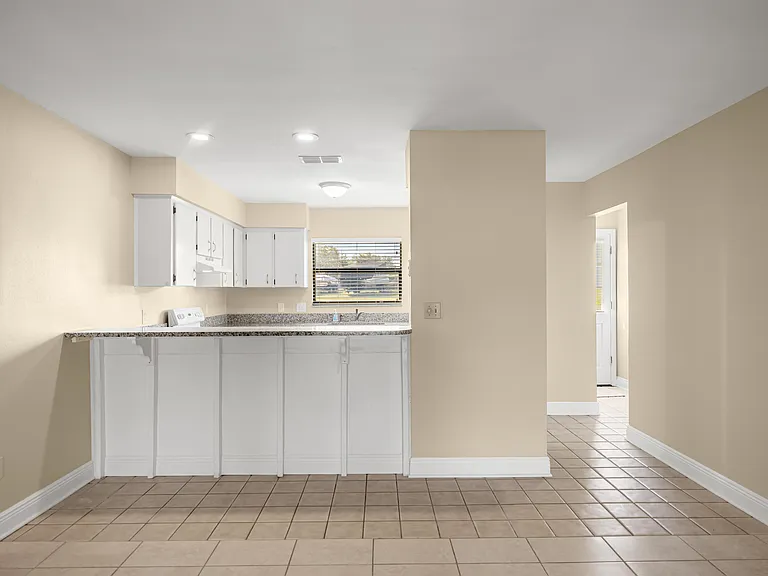 View of the dining room and kitchen