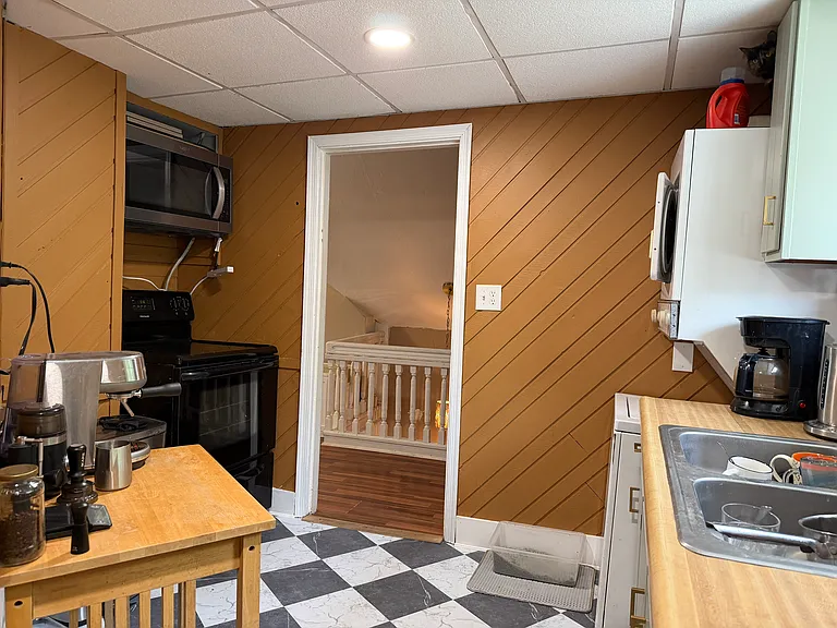 includes microwave - double sink - in-unit washer/ dryer