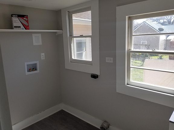 Large bright laundry room for your appliances.