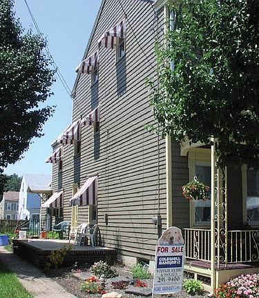 side of home with driveway