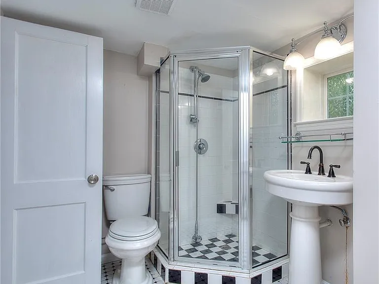 This is an old picure of the lower level bathroom. The bathroom now is walk in and full renovated.