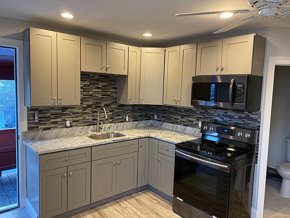 Updated kitchen. Brand new electric stove with built in air fryer.