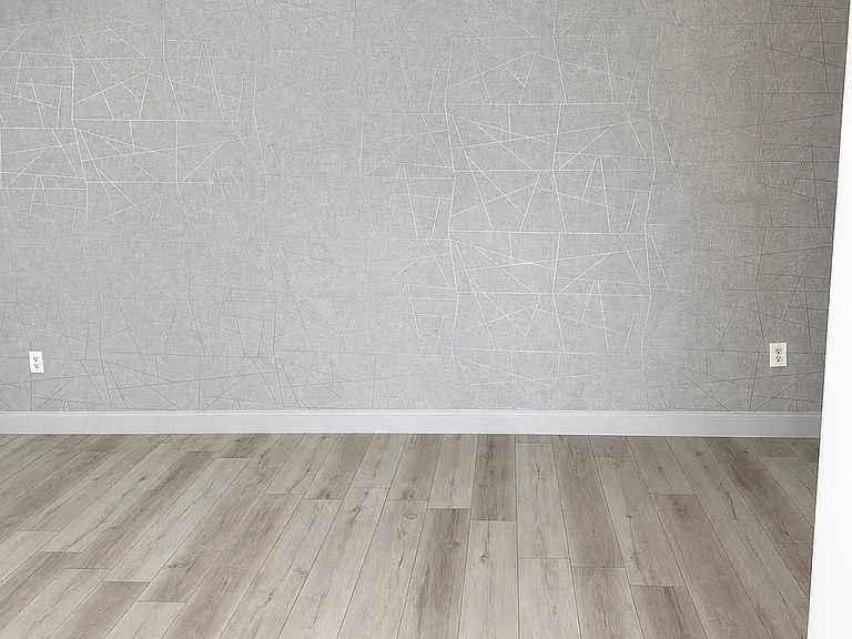 Custom geometric wallpaper feature wall